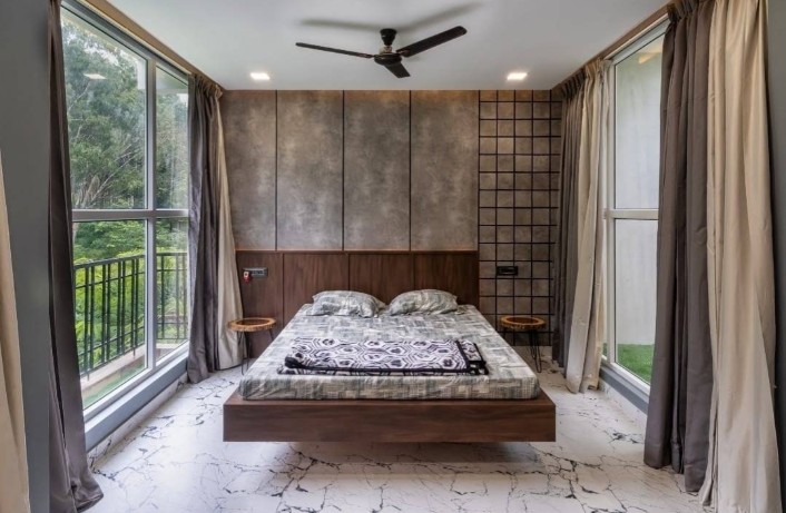 Bedroom with panoramic windows and marble floor